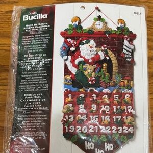 Bucilla Santa Fireplace Felt Advent Calendar in Red, Green & White